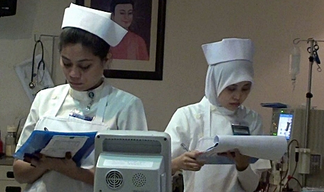 護士諾拉麗查（Norazliza Ali ）（左）表示互相補位才是當務之急，開齋節事後還是一樣可以慶祝。【攝影者：王明麗】