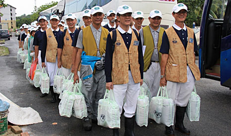 2013年12月東海岸發生嚴重水患，全馬慈濟志工愛心不間斷，分批前往災區接力賑災。（攝影者：莊鞳勛）